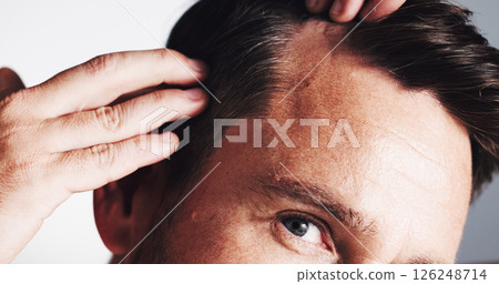 Hairline, growth and closeup with man in studio for scalp inspection, beauty and alopecia treatment. Grooming, self care and dandruff with mature person on white background for clean and texture Hairline, growth and closeup with man in studio for scalp inspection, beauty and alopecia treatment. Grooming, self care and dandruff with mature person on white background for clean and texture 126248714