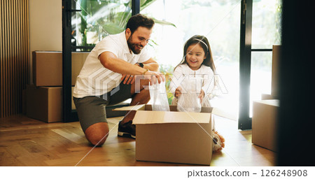 Box, moving in or relocation with dad and daughter in new home for property or real estate investment. Development, growth or unpacking with single parent man and girl child in apartment for mortgage 126248908