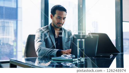 Laptop, corporate and business man typing finance report, investment portfolio and actuary reading email. Computer, internet and employee in office for risk assessment, project or research online Laptop, corporate and business man typing finance report, investment portfolio and actuary reading email. Computer, internet and employee in office for risk assessment, project or research online 126248974