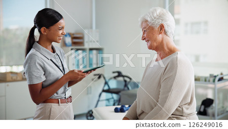 Physiotherapy, tablet and happy woman with mature patient with medical results, consulting and mobility. Physical therapy, chiropractor and person on digital tech for diagnosis, treatment or recovery Physiotherapy, tablet and happy woman with mature patient with medical results, consulting and mobility. Physical therapy, chiropractor and person on digital tech for diagnosis, treatment or recovery 126249016