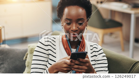 Black woman, happy and typing with phone on sofa for text message, dating site and social media scroll. Relax, person and internet connection in home for streaming service, reading ebook and research Black woman, happy and typing with phone on sofa for text message, dating site and social media scroll. Relax, person and internet connection in home for streaming service, reading ebook and research 126249017