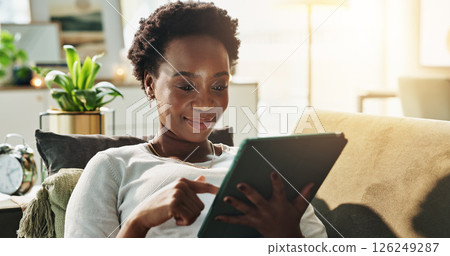 Black woman, research or tablet in home with choice for online blog, interior design or social media. Check, living room or happy person on technology for house renovation tips, digital app or option 126249287
