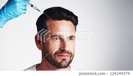 Scalp, needle and beauty with man in studio for prp injection, hair growth and aesthetic treatment. Collagen benefits, anti aging and cosmetics with mature person and hand on white background 126249374