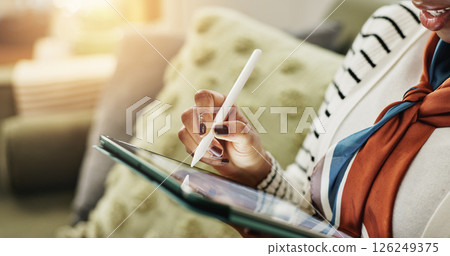 Woman, hands or pen on tablet in home to search for online blog, interior design and social media. Digital app, lounge or closeup of female person on touchscreen technology for house renovation tips 126249375