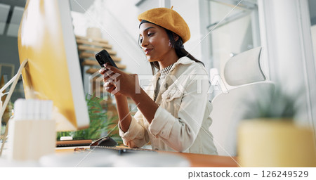 Smile, creative and woman with phone in office for chat, review article and contact for source check. Journalist, computer and mobile for research, reading email and information for story publication Smile, creative and woman with phone in office for chat, review article and contact for source check. Journalist, computer and mobile for research, reading email and information for story publication 126249529