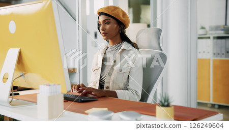 Intern, designer or Indian woman on computer in startup for artistic project, digital media or video editing. Creative, typing or research for content creation, post production or filmmaking software 126249604