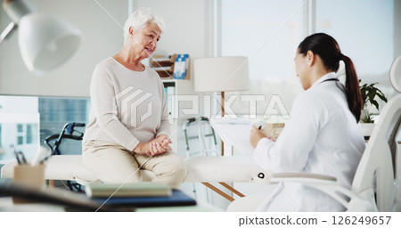 Writing, doctor and consulting with old woman in office for patient records, insurance and feedback. Healthcare results, support and medical help with people in clinic for advice and elderly care 126249657