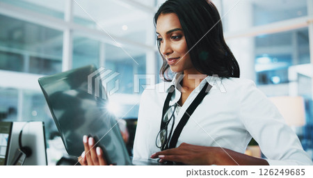 Woman, developer and smile with laptop in office of programming, coding support and server update. Person, online app and IT for testing system, website application and troubleshooting at call centre 126249685