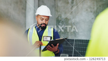Building, clipboard and inspection with construction worker man on site for civil engineering or development. Checklist, planning and reading with developer person on location for project management 126249713