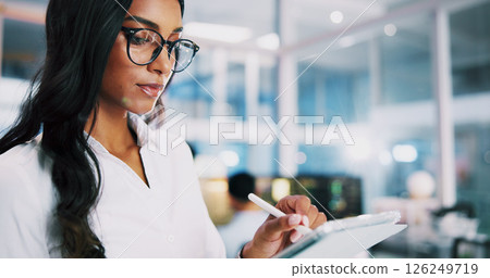 Woman, developer and typing on stylus in office for IT, coding software and server update. Female person, tablet and testing app for online programming, website application and troubleshooting system 126249719