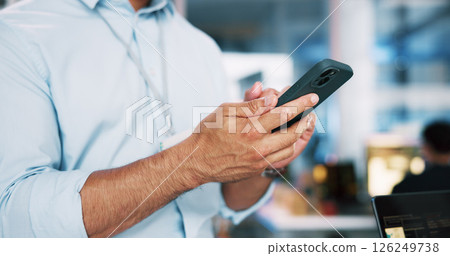 Business, hands and man in office, smartphone and message to contact, programming and email. Closeup, person and employee in workplace, cellphone and coding with digital app, connection and internet 126249738