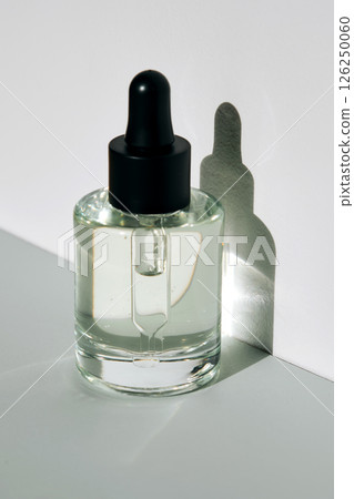 Face serum oil in the sun. 126250060