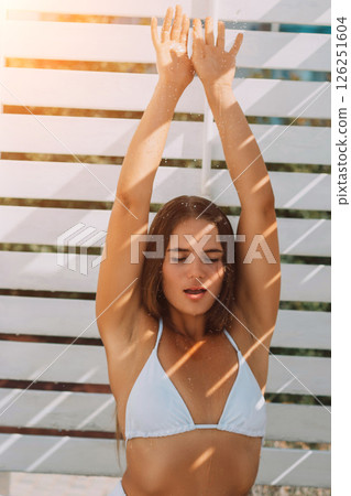 Woman Beach Summer: White Bikini, Sunlight, Outdoor Relaxation, Idyllic Vacation. 126251604