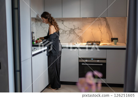 Woman Cooking Kitchen Apartment: Morning Meal Preparation Modern Home 126251605