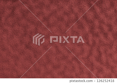Faux fur , fluffy velours red fabric, cloth macro texture with wavy effect, upholstery textile 126252418