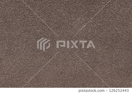 Grainy texture of brown colored asphalt, plaster, cement, plastic close up, macro background Grainy texture of brown colored asphalt, plaster, cement, plastic close up, macro background 126252443