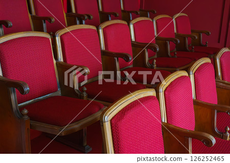 Empty rows of retro red theater or cinema seats with red upholstery. 126252465