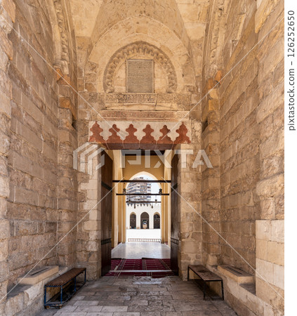 Exploring the intricate architecture of Al-Zahir Baybars Mosque in Cairo, Egypt with stunning stonework Exploring the intricate architecture of Al-Zahir Baybars Mosque in Cairo, Egypt with stunning stonework 126252650