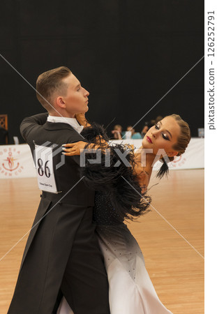 couple dancing standard European program on the dance floor couple dancing standard European program on the dance floor 126252791