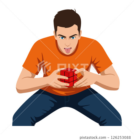 Young man solving red Rubiks Cube puzzle wearing orange shirt and blue jeans sitting pose Young man solving red Rubiks Cube puzzle wearing orange shirt and blue jeans sitting pose 126253088