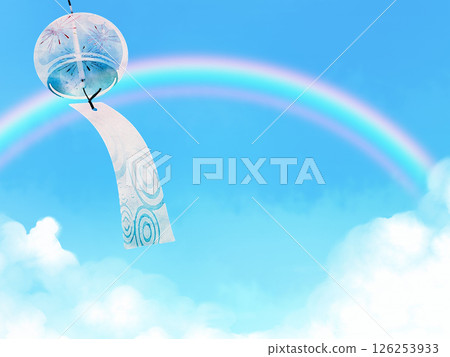 Wind chimes swaying in the wind under the blue sky 126253933