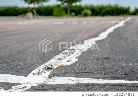fabric coving on top of an asphalt crack repair  126254851