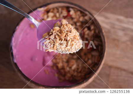 Healthy yogurt bowl with granola for breakfast 126255136