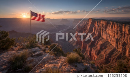 Sunset over grand canyon with american flag and river view. 126255208