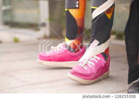 cerebral palsy child wearing leg brace for mobility., 126255308