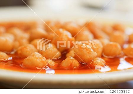 Close-Up of Saucy Chickpeas in a Tasty Tomato-Based Dish Close-Up of Saucy Chickpeas in a Tasty Tomato-Based Dish 126255552