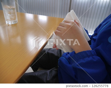 Child wiping hands with a towel (no face) Child wiping hands with a towel (no face) 126255778