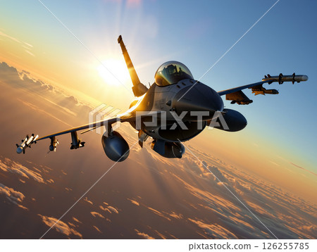 Fighter Jet Soaring Through Clouds at Sunset in a Dramatic Aerial Display 126255785