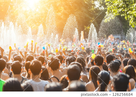 Celebrating Joyous Water Play During Traditional Songkran Festival with Water Guns and Smiles Celebrating Joyous Water Play During Traditional Songkran Festival with Water Guns and Smiles 126256684