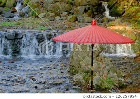 Autumn Kifune River and Japanese umbrellas 126257954