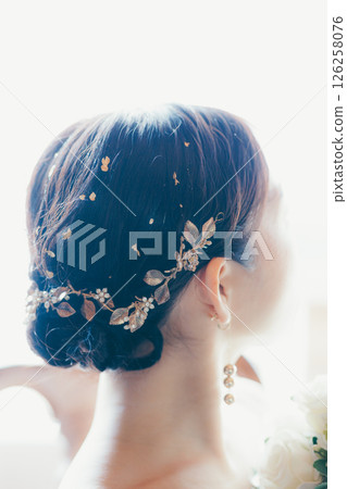 A woman in a wedding dress | A scene from getting ready for marriage 126258076