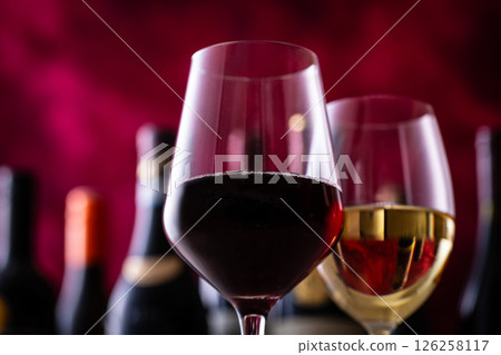Drinking wine at a restaurant Drinking wine at a restaurant 126258117