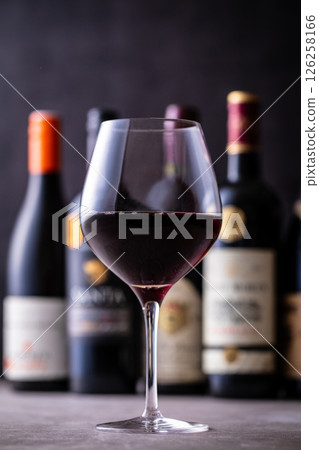 Drinking red wine in a restaurant 126258166