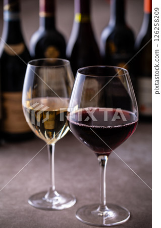 Drinking wine at a restaurant Drinking wine at a restaurant 126258209