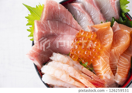 Bowl of rice topped with sashimi Bowl of rice topped with sashimi 126259531