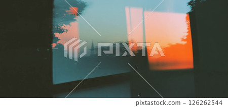 Reflective textures blend vintage elements with modern artistry during a sunset backdrop. 126262544