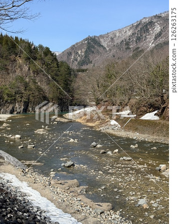 Shirakawa-go is historic village in Gifu Prefecture, famous for its gassho-zukuri farmhouses with steep thatched roofs, a UNESCO World Heritage Site. 126263175