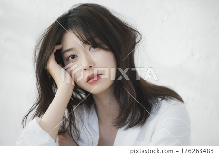 Young woman relaxing in the living room 126263483