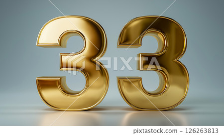 Gold metallic number 33 displayed against a simple backdrop 126263813