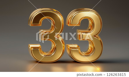 Golden metal number 33 displayed prominently on a neutral backgroun 126263815