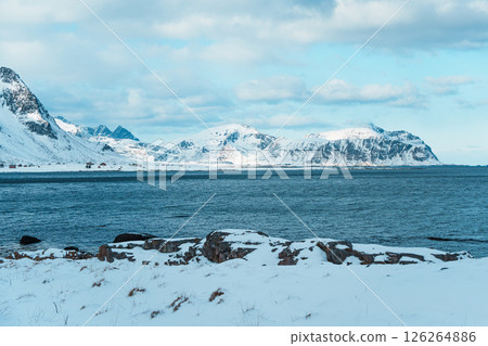 Lofoten winter landscape with fjord and snowy peaks Lofoten winter landscape with fjord and snowy peaks 126264886