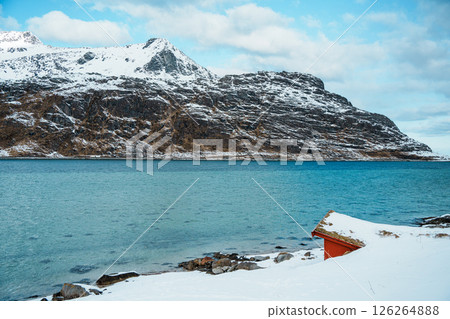 Lofoten winter landscape with fjord and snowy peaks Lofoten winter landscape with fjord and snowy peaks 126264888