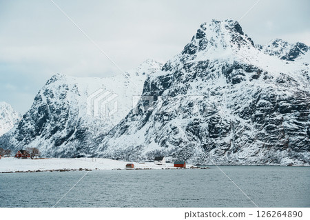Lofoten winter landscape with fjord and snowy peaks Lofoten winter landscape with fjord and snowy peaks 126264890