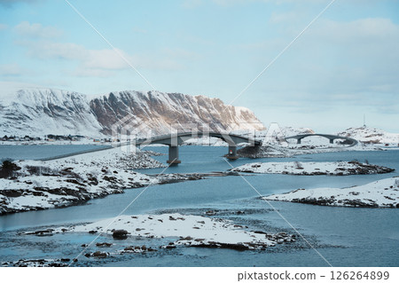 Lofoten winter landscape with fjord and snowy peaks Lofoten winter landscape with fjord and snowy peaks 126264899