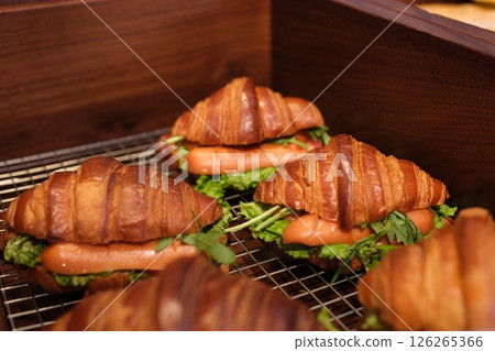 croissant with sausages Delicious of Sausage Croissant on white with Clipping Path. 126265366