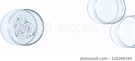 A sample of skin serum or moisturizing gel in a Petri dish. A cosmetic product. Copy space 126266199